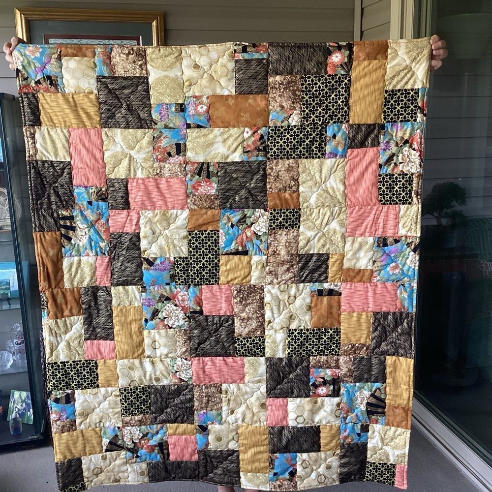 NWT. Hand Crafted Gold Toned Prints with Oriental Influence Quilt